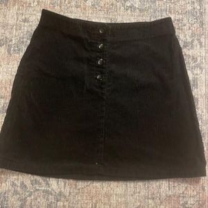 H&M black corduroy skirt. Button front. Worn twice.
